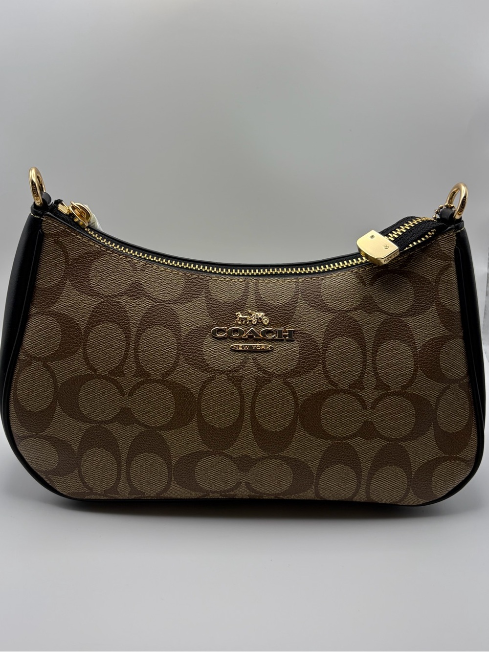 Coach Brown Signature Canvas Shoulder Bag with Black Trim and Gold Hardware